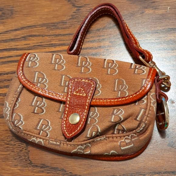 Dooney and Burke flap wristlet - Picture 1 of 2